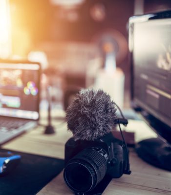 Freelance desk and laptop for editing footage is job for content upload to internet.